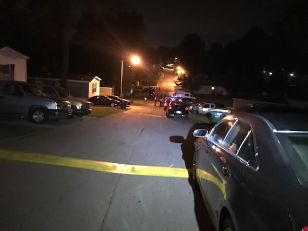 Gwinnett County police investigates a fatal shooting at Smokecreek mobile home park in unincorporated Snellville in 2018.