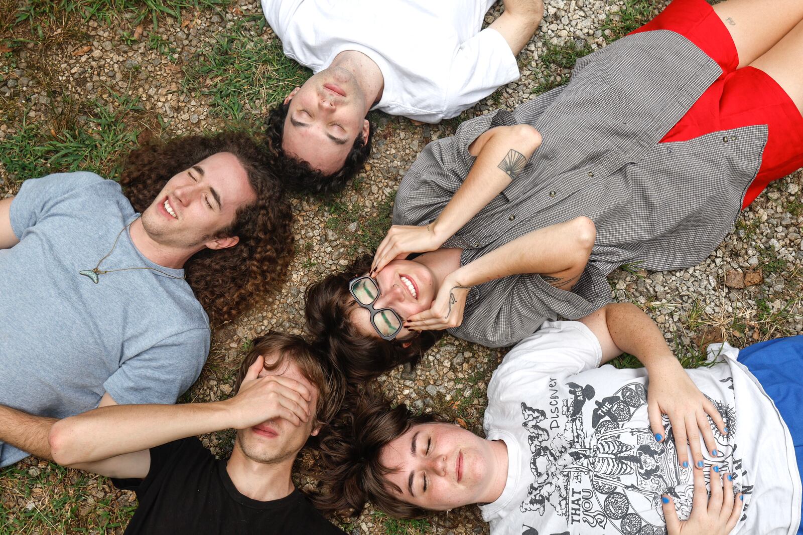 Rock band Lunar Vacation poses for a portrait at their home in Decatur on Tuesday, Aug. 20, 2024. (Natrice Miller/AJC)