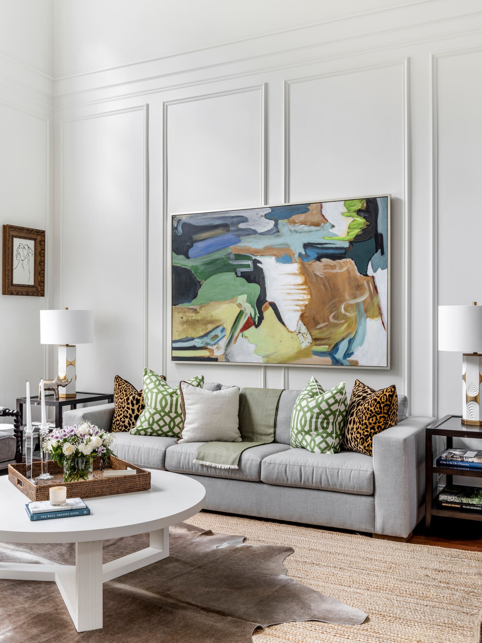 All-white interiors are overdone, says interior designer Erika Hollinshead Ward. Add an element of color with bold, oversized artwork. Photo: Robert Peterson