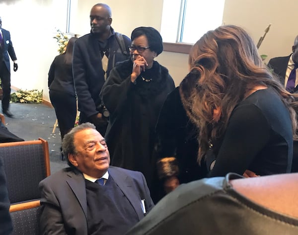  CBS46's Sharon Reed greets former Atlanta mayor Andrew Young. CREDIT: Rodney Ho/rho@ajc.com