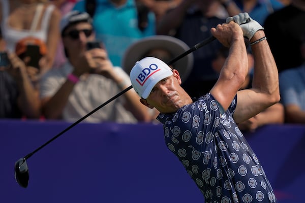 Billy Horschel of the United States hits off the first tee during the first round of World Tour Golf Championship in Dubai, United Arab Emirates, Thursday, Nov. 14, 2024. (AP Photo/Altaf Qadri)