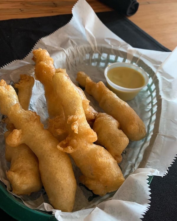 Frog legs with a jalapeno aioli from the menu of Big Game.