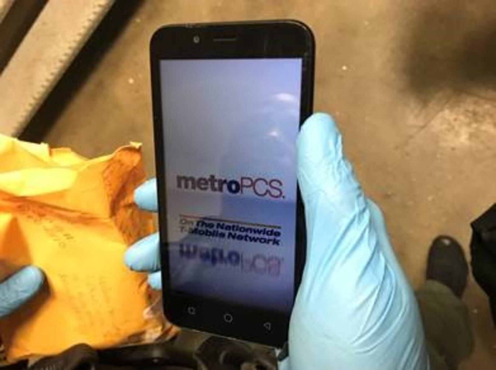 Officers found a cellphone during Tuesday's raid. (Credit: Fulton County Sheriff's Office)