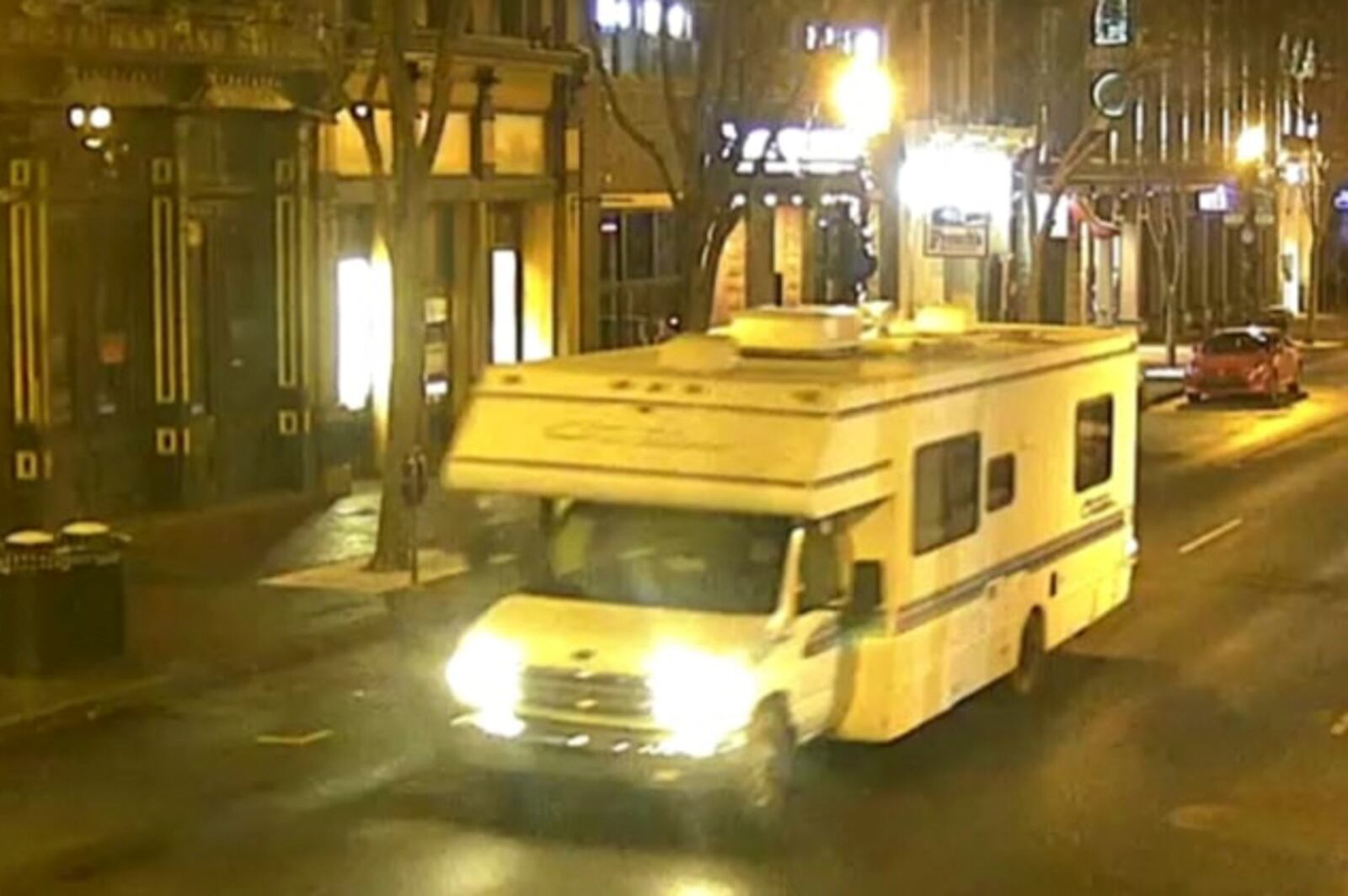 In an image released by the Metro Nashville Police Department, the RV that later exploded is driven through downtown Nashville during the early-morning hours of Christmas, Dec. 25, 2020. Three people were injured when the RV exploded at about 6 am on the normally-bustling 2nd Avenue, in what police said was apparently an intentional act. (Metro Nashville Police Department via The New York Times) -- FOR EDITORIAL USE ONLY --