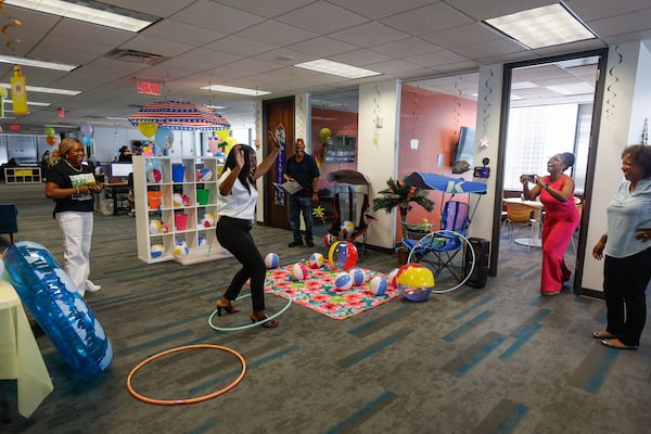 Employees have fun during a break at CallRail headquarters in Downtown Atlanta shown on Tuesday, July 9, 2024. (Natrice Miller/ AJC)