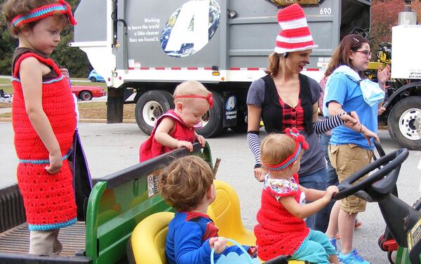 At the Buford Touch-a-Truck & Treat, kids dress in costume and "trunk or treat" with the owners of a variety of cars and trucks.