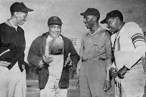 The coaching staff for the Wolverines of Morris Brown College are shown in this b/w photo copied from a 1951 football program. L to R, they are: William T. Greene, Backfield Coach; Edward J. Clemmons, Head Coach; Clarence O. Brown, Line Coach; and Thomas L. Caldwell, Asst. Line Coach. (AJC file photo)