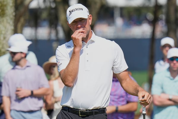 Lucas Glover reacts after missing a putt on the fifth hole during the third round of The Players Championship golf tournament Saturday, March 15, 2025, in Ponte Vedra Beach, Fla. (AP Photo/Chris O'Meara)