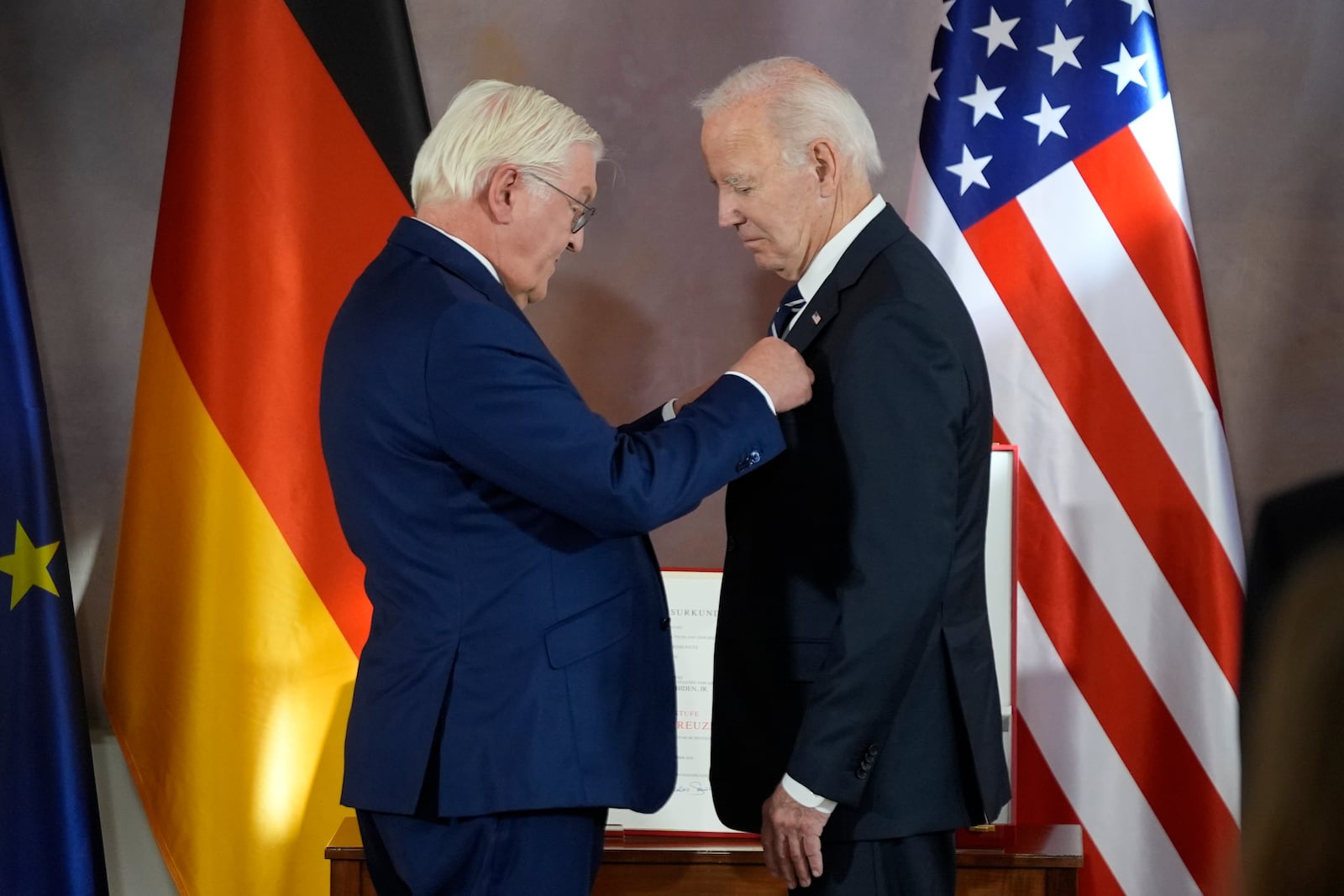 President Joe Biden receives Germany's Grand Cross special class of the Order of Merit by German President Frank-Walter Steinmeier at Bellevue Palace in Berlin, Germany, Friday, Oct. 18, 2024. (AP Photo/Matthias Schrader)