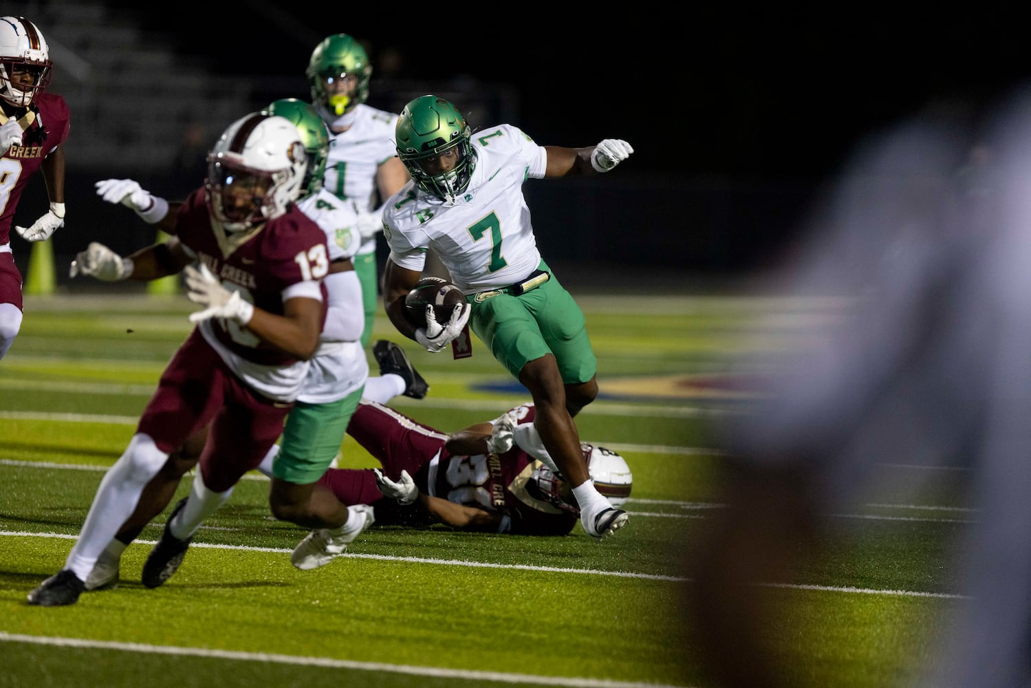 Buford’s Dylan Mccoy (7) runs the ball against Mill Creek. (Photo/Jenn Finch, AJC)