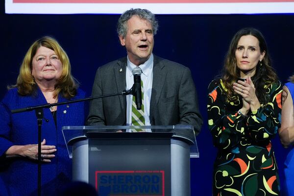 Democratic Ohio Sen. Sherrod Brown speaks during a watch party on election night, Tuesday, Nov. 5, 2024, in Columbus, Ohio, next to his wife Connie Schultz, left, and his daughter Elizabeth Brown, right.(AP Photo/Joshua A. Bickel)