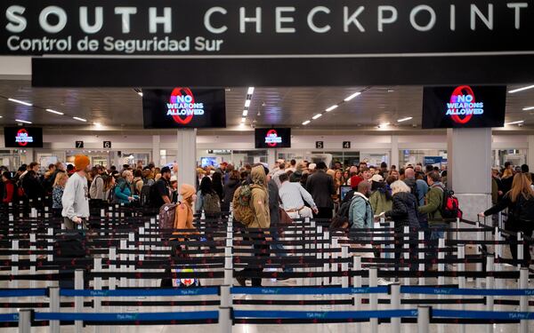 Post holiday travelers descend on Atlanta's Hartsfield-Jackson International Airport on Friday, December 27, 2024 (Ben Hendren for the Atlanta Journal-Constitution)