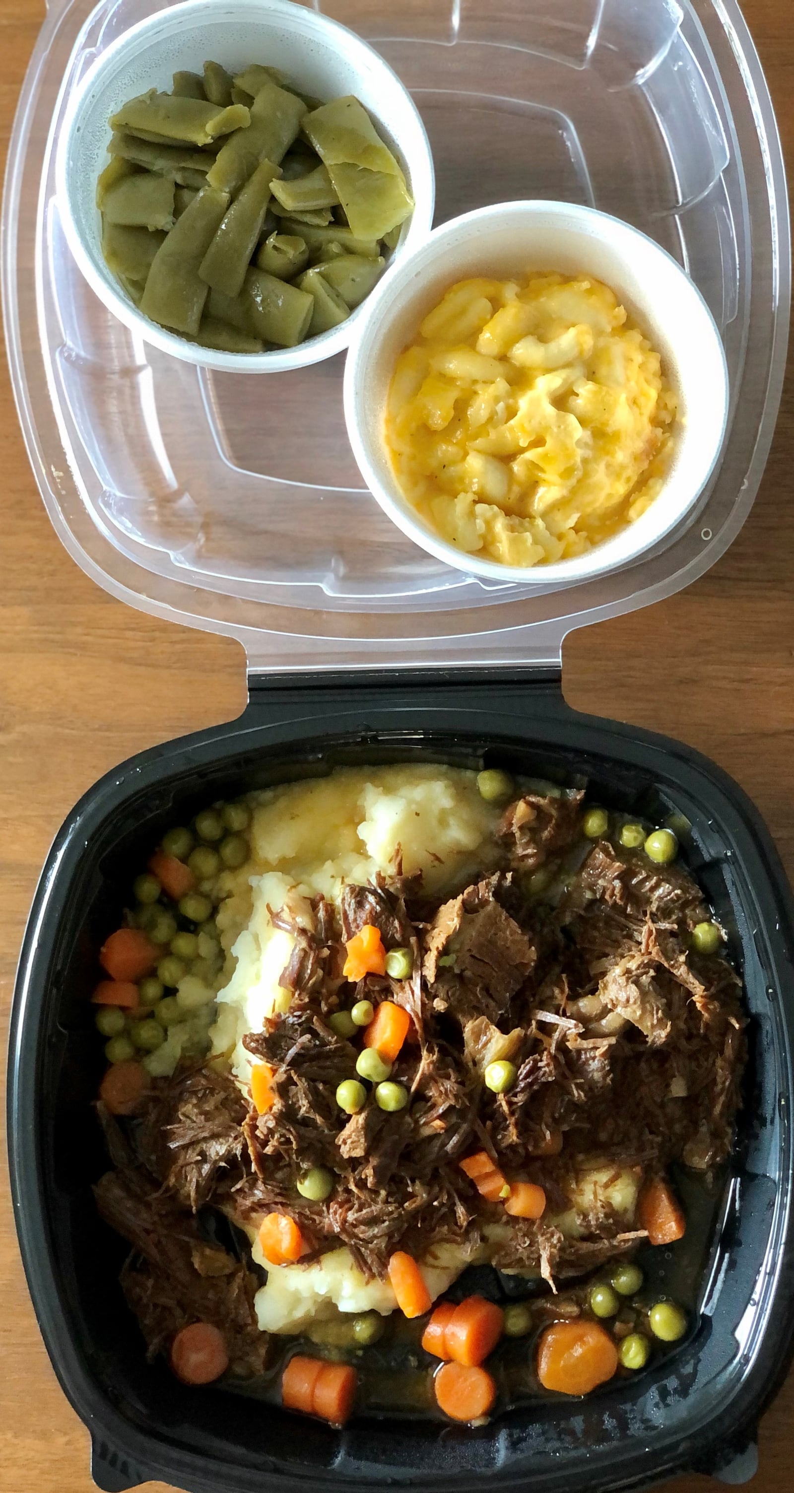 Pot roast, a Colonnade classic, is shown here with pole beans and macaroni and cheese. Wendell Brock for The Atlanta Journal-Constitution