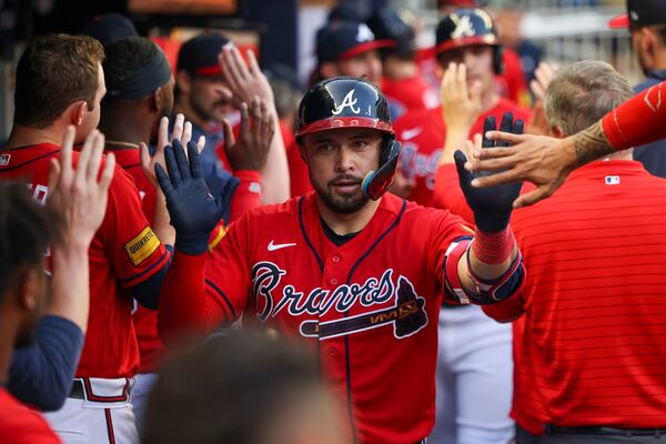 Atlanta Braves’ Travis d'Arnaud celebrates with teammates in the dugout after hitting a two-run home run during the third inning against the Colorado Rockies at Truist Park, Friday, June 16, 2023, in Atlanta. This was d’Arnaud’s second home run in the game. Jason Getz / Jason.Getz@ajc.com)