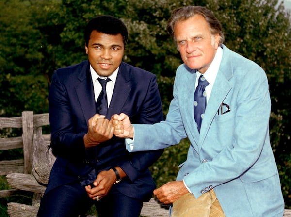 Muhammad Ali visiting with the Rev. Billy Graham in a vintage photo. Photo: billygraham.org