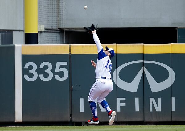 Atlanta Braves' Adam Duvall catches a ball hit by Milwaukee Brewers' Jackie Bradley Jr. in the third inning of a baseball game Sunday, Aug. 1, 2021, in Atlanta. (AP Photo/Ben Margot)