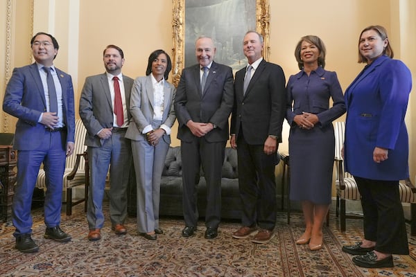 Sen. Majority Leader Chuck Schumer, D-N.Y., center, welcomes incoming Democrat senators in his office Tuesday, Nov. 12, 2024, in Washington, from right, Sen.-elect Elissa Slotkin, D-Mich, Sen.-elect Lisa Blunt Rochester, D-Del., Sen.-elect Rep. Adam Schiff, D-Calif, Schumer, Sen.-elect Angela Alsobrooks, D-Md., Sen.-elect Ruben Gallego, D-Ariz., Sen.-elect Rep. Andy Kim, D-N.J. AP Photo/Mariam Zuhaib)