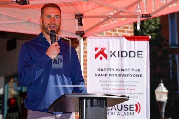 Quarterback Kirk Cousins speaks about prioritizing fire safety with his family at Kidde's Cause For Alarm donation event on Monday, October 21, 2024 in Marietta, Ga.