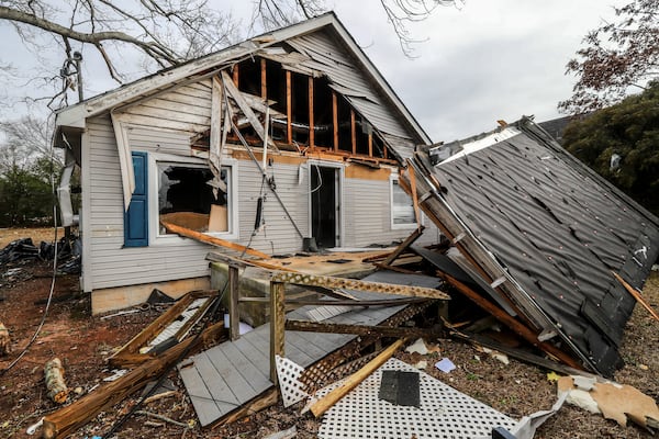  A home was hard hit on McIntosh Road in Griffin, Georgia on Jan. 13, 2023, following violent overnight storms. (John Spink/The Atlanta Journal-Constitution)

