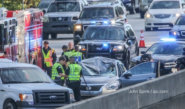 A driver died Thursday when a tire from a truck flew into the person's car on Ga. 400 in Sandy Springs.