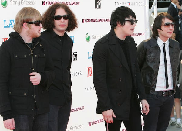 FILE - Members of the band My Chemical Romance arrive for the MTV Video Music Awards Japan 2007 ceremony in Saitama city, near Tokyo, on May 26, 2007. (AP Photo/Koji Sasahara, file)