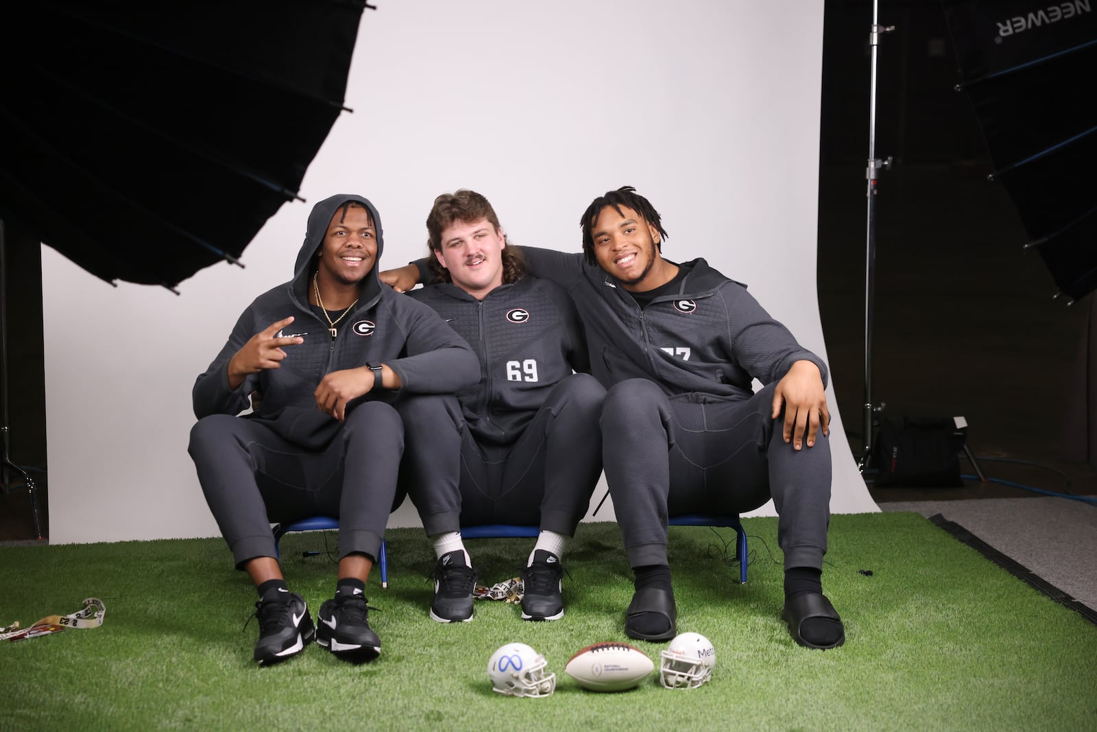 Georgia offensive lineman from left to right; Warren McClendon, Tate Ratledge, Devin Willock pose for a photograph during Georgia’s media day at the Los Angeles Convention Center, Sat., Jan. 7, 2023, in Los Angeles, Ca. Georgia plays TCU for the 2023 College Football Playoff National Championship Mon. Jan. 9, 2023, at SoFi Stadium.  (Jason Getz / Jason.Getz@ajc.com)