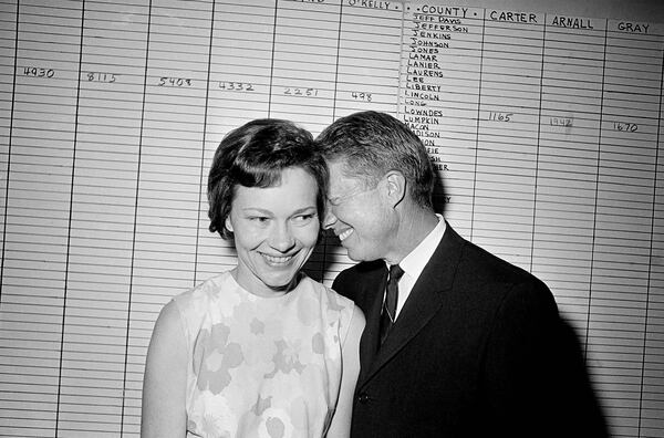 Then Georgia State Sen. Jimmy Carter hugs his wife, Rosalynn, at his Atlanta campaign headquarters in 1966 after making a strong showing in the Democratic primary election for governor of Georgia.