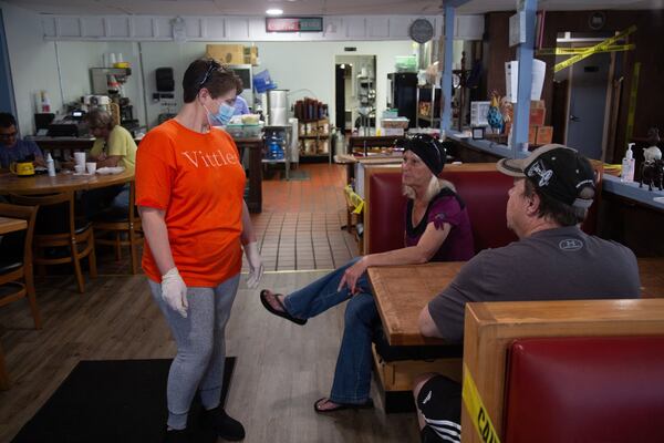 Vittles Restaurant owner Charity Salyers talks with customers in her Smyrna restaurant Thursday, May 14, 2020. STEVE SCHAEFER FOR THE ATLANTA JOURNAL-CONSTITUTION