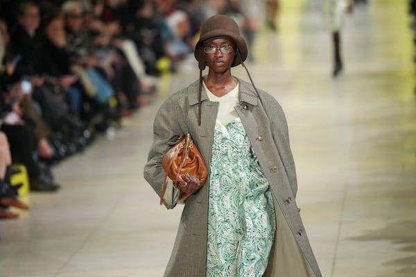 A model wears a creation as part of the Miu Miu Fall/Winter 2025-2026 Womenswear collection presented Tuesday, March 11, 2025. in Paris. (Photo by Scott A Garfitt/Invision/AP)