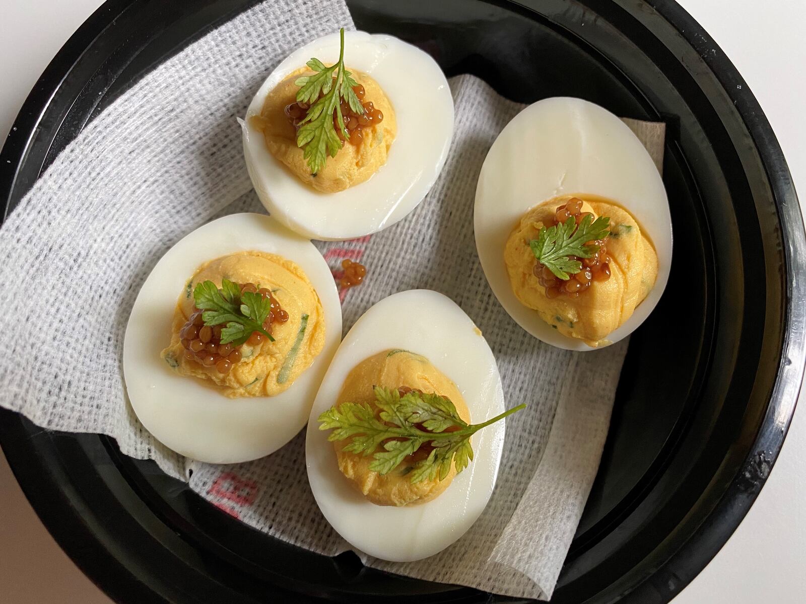 Southern-style deviled eggs are among the takeout picnic dishes available from Gunshow. CONTRIBUTED BY BOB TOWNSEND
