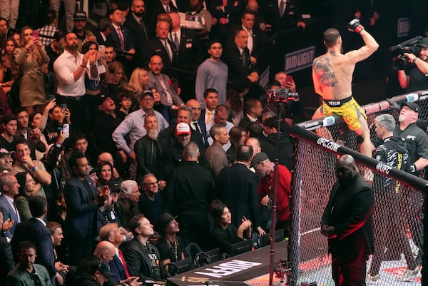 Dana White, Vivek Ramaswamy, President-elect Donald Trump, Elon Musk and Kid Rock watch as Brazil's Mauricio Ruffy celebrates his win over Peru's James Llontop at UFC 309 at Madison Square Garden, Saturday, Nov. 16, 2024, in New York. (AP Photo/Evan Vucci)