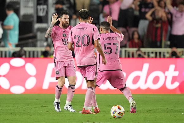 Inter Miami forward Lionel Messi (10) celebrates after scoring a goal during the second half of an MLS playoff opening round soccer match against Atlanta United, Saturday, Nov. 9, 2024, in Fort Lauderdale, Fla. (AP Photo/Rebecca Blackwell)