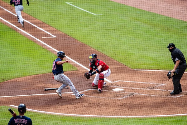 Braves catcher Tyler Flowers (25) tags out Boston Red Sox shortstop Tzu-Wei Lin (30) at home plate during the second inning of the regular season finale Sunday, Sept. 27, 2020, at Truist Park in Atlanta.  (Alyssa Pointer / Alyssa.Pointer@ajc.com)