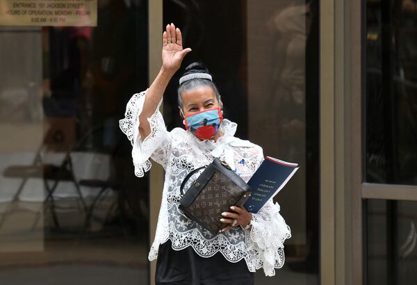 July 30, 2020 Atlanta - Xernona Clayton waves as she exits after the funeral for Rep. John Lewis at Ebenezer Baptist  Church on Thursday, July 30, 2020 Thursday, July 30, 2020. (Hyosub Shin / Hyosub.Shin@ajc.com)