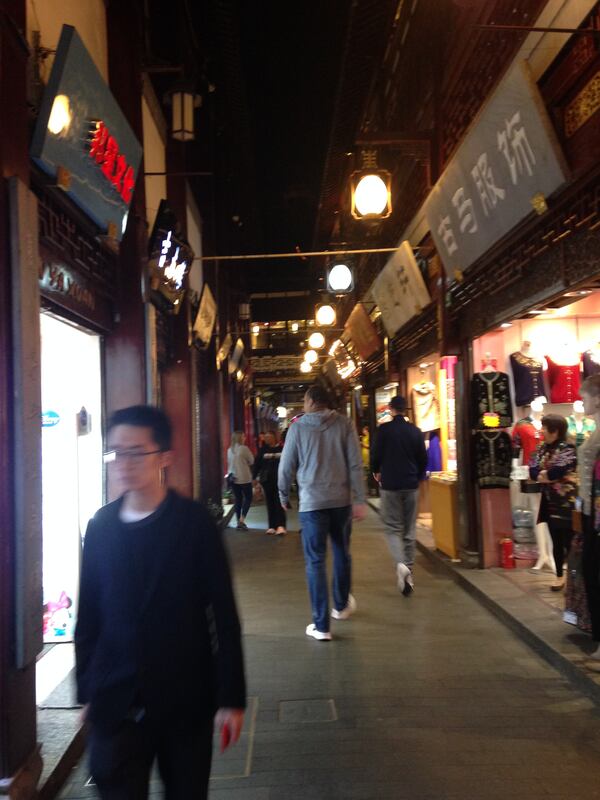 Georgia Tech assistant coach Tavaras Hardy on the prowl for souvenirs on the team's final night in Shanghai.