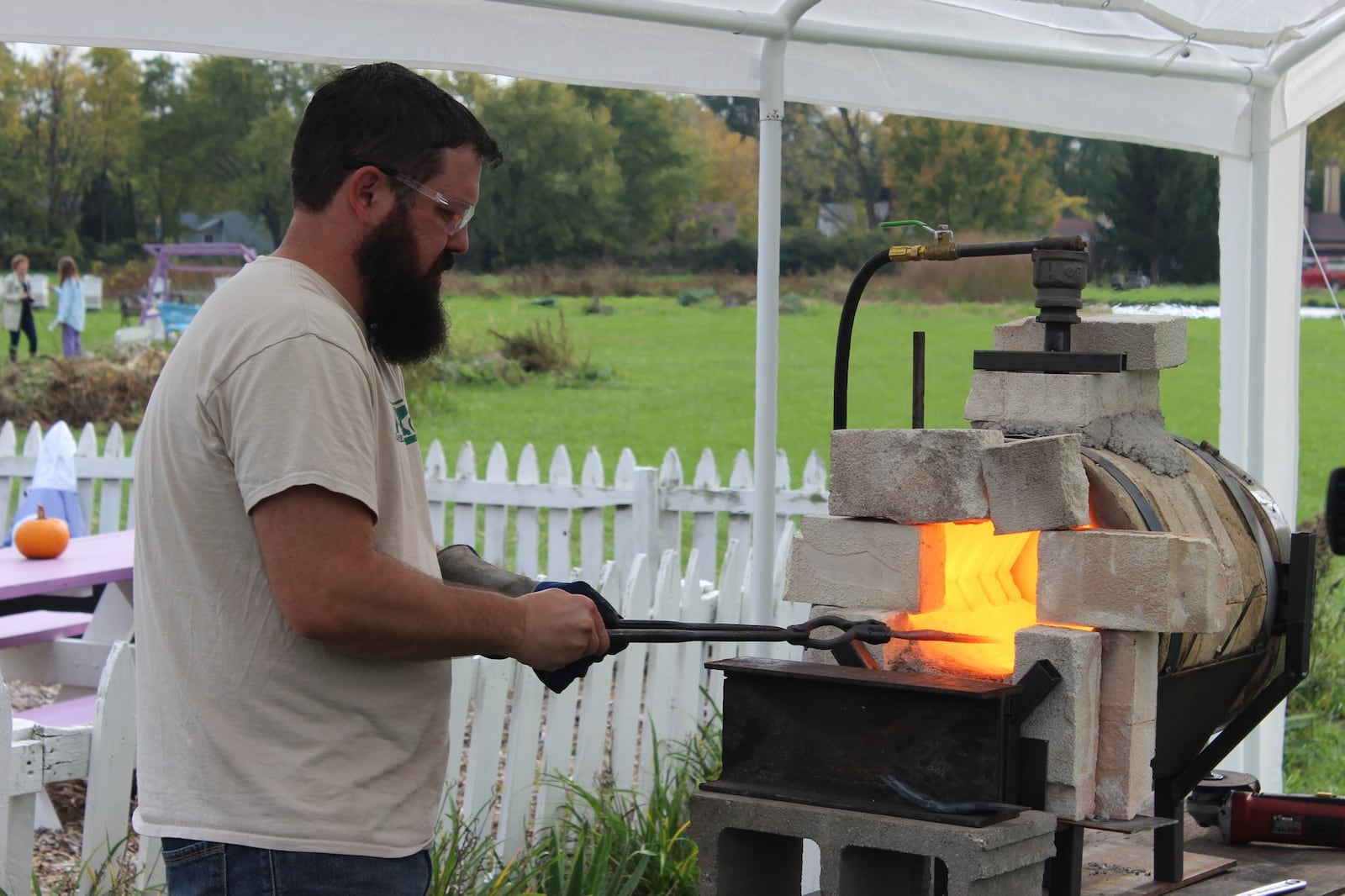 Mike Martin, a Mennonite pastor and blacksmith, works at the forge in Toledo, Ohio. CONTRIBUTED