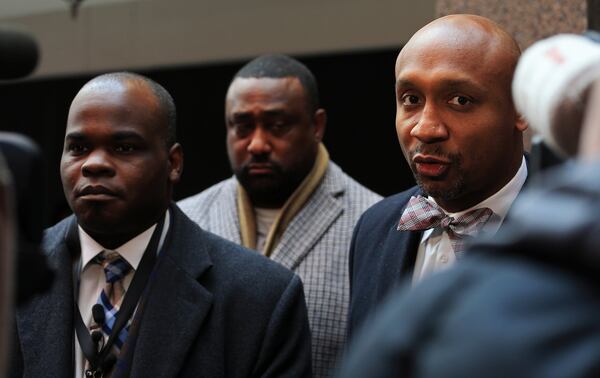 Attorney Mawuli Davis reaffirms his client, Basil Eleby’s innocence to reporters after the Fulton County Behavioral Health Treatment Court Transition program graduation on Friday, February 28, 2020, at the Fulton County Government Center Assembly Hall in Atlanta. Eleby, once accused of starting the fire that caused the I-85 bridge collapse, graduated from the 18-month mental health and sobriety program that he agreed to as part of a deal with prosecutors (Christina Matacotta, for The Atlanta Journal-Constitution).