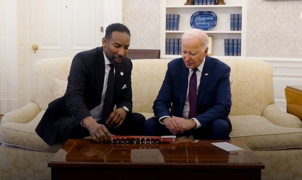 Atlanta Mayor Andre Dickens (left) visits with President Joe Biden in the Oval Office to discuss infrastructure improvements made in the city with the help of federal funding. (Courtesy of the White House 2024)