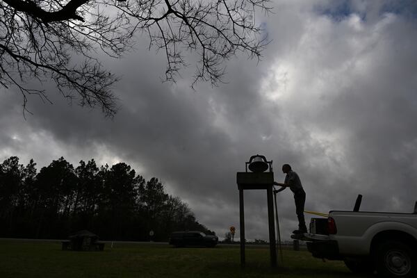 National Park Service employee Ronald Hobkirk works on a bell at the Jimmy Carter Boyhood Farm. (Washington Post photo by Matt McClain)