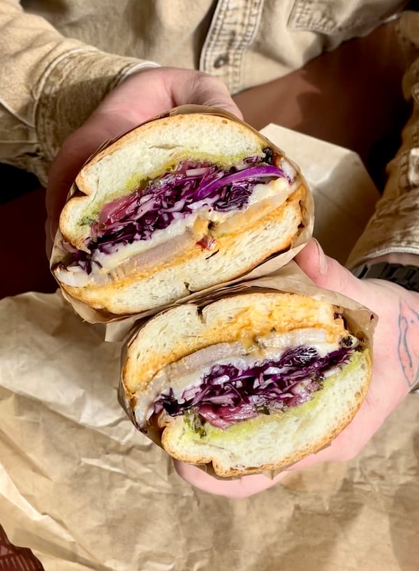 You can get a porchetta melt at Bona Fide Deluxe that includes provolone, cabbage, jalapeno salsa verde, pickled onions and chorizo mayo. Courtesy of Katie McDonald