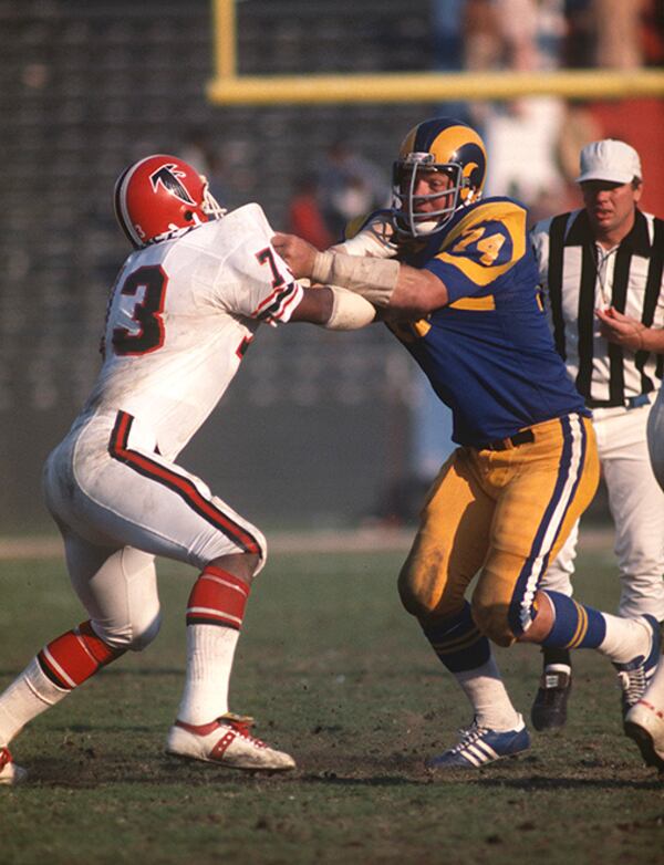 Phil McKinnely (left) was an offensive tackle with the Atlanta Falcons from 1976 to '80.