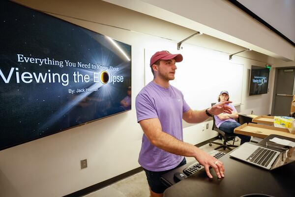 Ethan Atkinson, president of the Georgia Tech Astronomy Club, speaks to club members as they hold their regular meeting Monday, April 1, 2024, to discuss and plan their upcoming trip to see the April 8 eclipse. (Miguel Martinez /miguel.martinezjimenez@ajc.com)