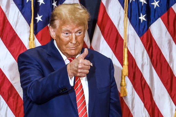 Former US President and Republican presidential hopeful Donald Trump arrives for a "Commit to Caucus" rally in Clinton, Iowa, on Jan. 6, 2024. (Tannen Maury/AFP via Getty Images/TNS)