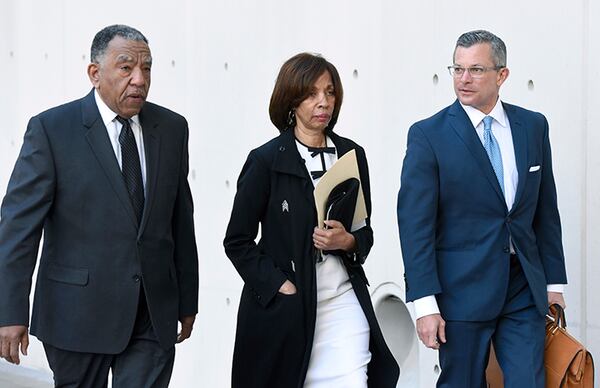 Former Baltimore mayor Catherine Pugh, center, and her attorney Steven Silverman, right, arrive Thursday for a sentencing hearing at U.S. District Court in Baltimore.