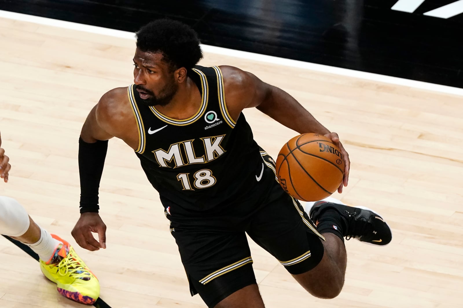 Atlanta Hawks forward Solomon Hill (18) is shown in action against the Milwaukee Bucks in the second half of an NBA basketball game Thursday, April 15, 2021, in Atlanta. (AP Photo/John Bazemore)