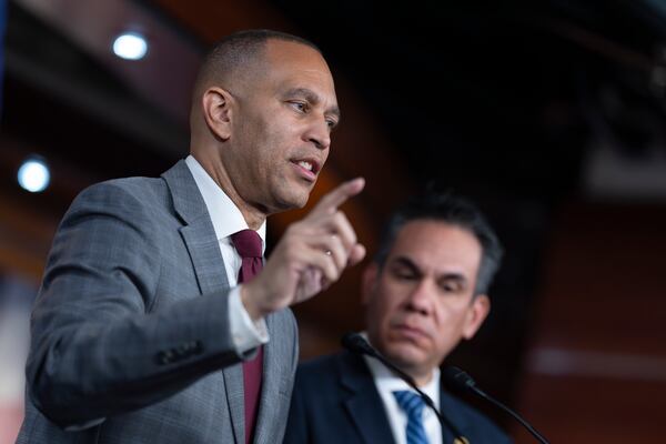 House Minority Leader Hakeem Jeffries (left), D-N.Y., and Rep. Pete Aguilar, D-Calif., the caucus chair, speak at a news conference Thursday after President-elect Donald Trump abruptly rejected a bipartisan plan to prevent a Christmastime government shutdown. Jeffries accused Republicans of “unilaterally” breaking a bipartisan agreement. (J. Scott Applewhite/AP)