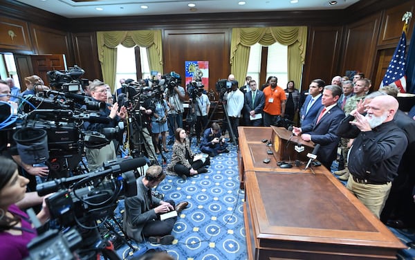 March12, 2020 Atlanta - Gov. Brian Kemp speaks as other officials standing behind during a press conference to provide an update on the state's efforts regarding COVID-19, after reporting the first death in Georgia related to coronavirus, at the Georgia State Capitol on Thursday, March 11, 2020. (Hyosub Shin / Hyosub.Shin@ajc.com)