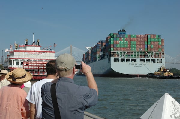 Savannah, Ga.: The Cosco Development, the largest container ship to ever call on an East Coast port, passes as a crowd gathers on River Street in Savannah as it moves on to the Garden City Terminal on the Savannah River on Thursday, May 11, 2017. J. Scott Trubey/strubey@ajc.com