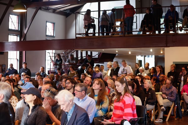 Members of the Inman Park community gather for a panel discussion about transportation on The Beltline at The Trolley Barn in Atlanta on Monday, March 11, 2024. (Natrice Miller/ Natrice.miller@ajc.com)