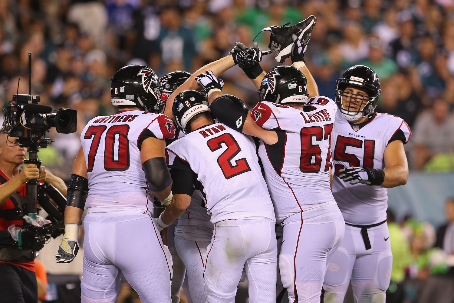 Photos: Falcons fall to Eagles in season opener